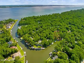 117 White Ash Drive, Pine Knoll Shores, NC 28512 – photo 16: Enjoy the privacy of the canal