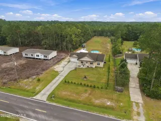 337 Folkstone Road, Holly Ridge, NC 28445 – photo 6: 5-web-or-mls-DJI_20260924091436_0005_D