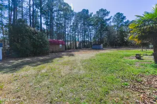 118 Woodland Drive, Swansboro, NC 28584 — 3-bedroom manufactured home in Hadnot Creek, Swansboro, NC, photo 15 of 16: Backyard