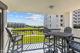 8801 Reed Drive 115, Emerald Isle, NC 28594 – photo 2: Spacious Covered Balcony w/ Great Views