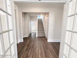 8615 Blue Haw Way Lot 125, Leland, NC 28451 — 3-bedroom home in Indigo Preserve, Leland, NC, photo 6 of 41: Downstairs Landing