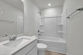 1153 Tennessee Walker Way, Bolivia, NC 28422 — 4-bedroom home in River Tide Farms, Bolivia, NC, photo 17 of 18: Hall Bath