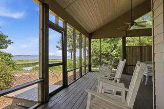 142 Oakleaf Drive, Pine Knoll Shores, NC 28512 – photo 10: Screened Porch