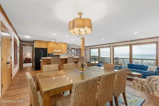 111 Dogwood Circle, Pine Knoll Shores, NC 28512 – photo 4: Open concept kitchen and dining