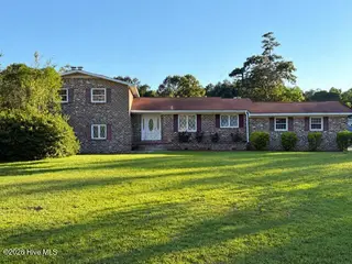 99 W Cornwallis Road, Riegelwood, NC 28456 — 4-bedroom home in Riegelwood, Riegelwood, NC, photo 1 of 36: Front AI