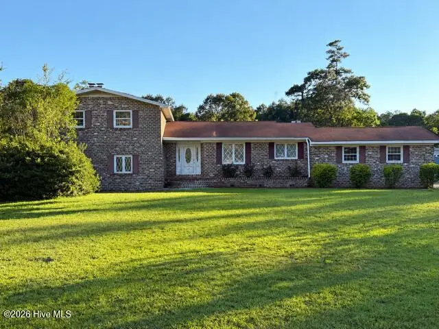99 W Cornwallis Road, Riegelwood, NC 28456 — 4-bedroom home in Riegelwood, Riegelwood, NC, photo 1 of 36: Front AI