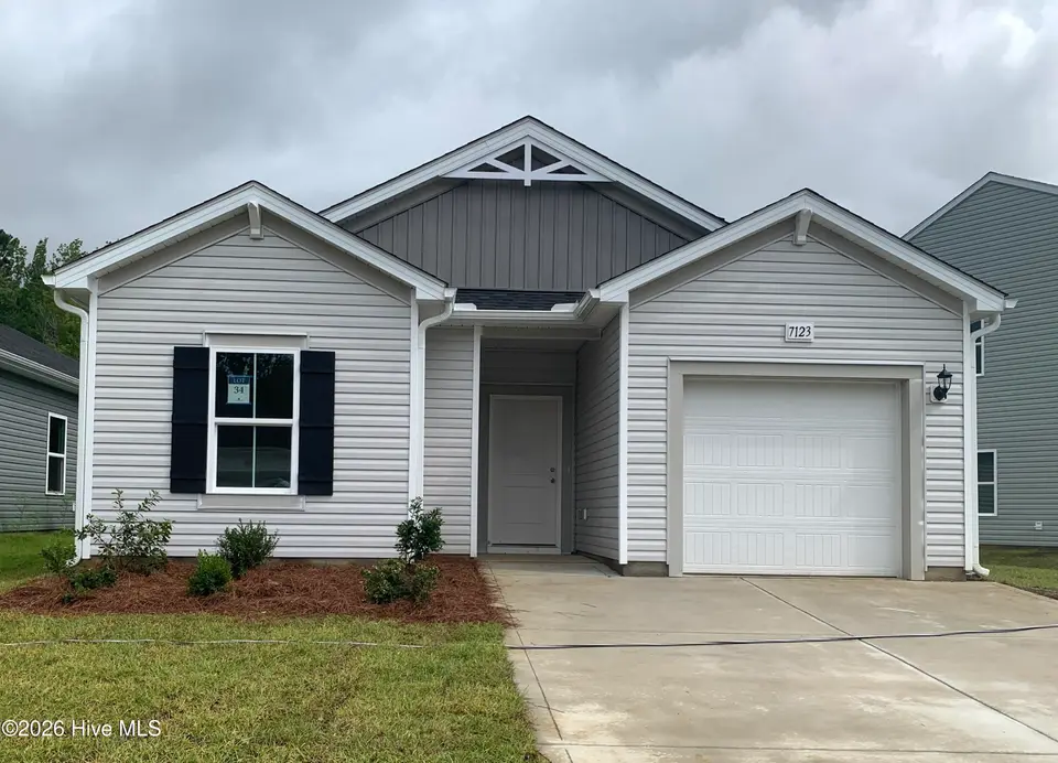 7123 Woodline Drive SW, Sunset Beach, NC 28468 – photo 1 of 27