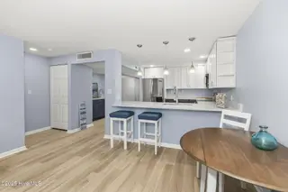 331 Salter Path Road 104 Beachwalk, Pine Knoll Shores, NC 28512 – photo 15: Updated kitchen w/ bar seating
