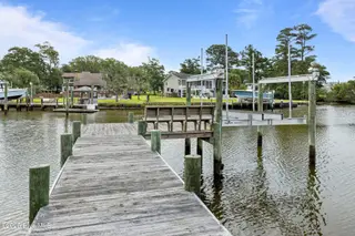 119 L 10 Cape Point Boulevard, Cape Carteret, NC 28584 – photo 9: Dock with Lift