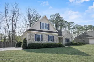 376 Crown Pointe Drive, Hampstead, NC 28443 – photo 6: sidefront_376