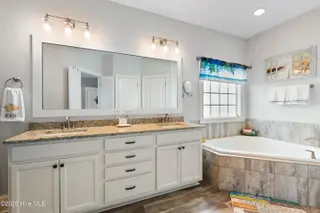 1353 Dunes Boulevard SW, Ocean Isle Beach, NC 28469 – photo 20: Spacious ensuite