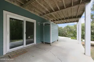 9936 Louise Howard Court East, Emerald Isle, NC 28594 — 3-bedroom townhome in Spinnakers Reach, Emerald Isle, NC, photo 13 of 32: Ground Floor Patio