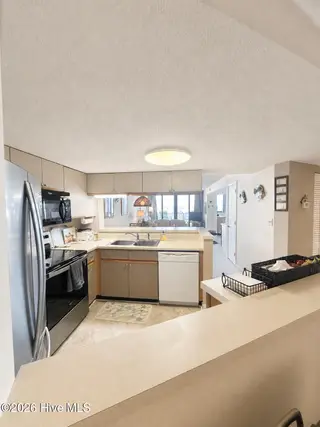 1400 E Fort Macon Road 313, Atlantic Beach, NC 28512 – photo 12: 313 Kitchen with a view