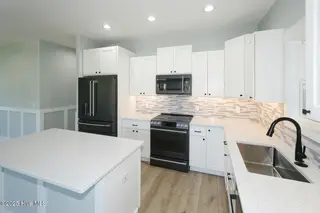 104 NE 52nd Street, Oak Island, NC 28465 – photo 9: 104 NE 52nd St Oak Island NC-large-010-0