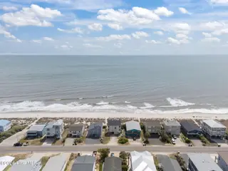 3909 W Beach Drive, Oak Island, NC 28465 – photo 22: 9-web-or-mls-DJI_20260408140229_0413_D