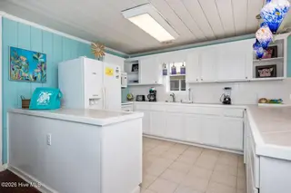 1025 W Beach Drive, Oak Island, NC 28465 – photo 15: 1025 W Beach 13