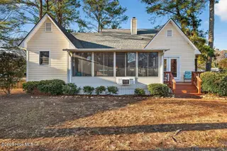 813 Plantation Drive, New Bern, NC 28562 – photo 4: Back Enclosed Sunroom
