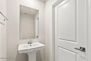 8031 Sterling Oaks Drive NW, Ash, NC 28420 – photo 17: Powder Rm