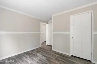 6777 Lewis Drive SE, Winnabow, NC 28479 – photo 21: Guest bedroom