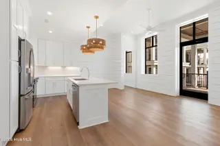 805 Mulberry Street Unit 108, Beaufort, NC 28516 — 3-bedroom condo in 805 Mulberry, Beaufort, NC, photo 11 of 25: Open Kitchen Living Room