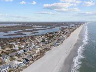 6618 W Beach Drive, Oak Island, NC 28465 – photo 18: 4-web-or-mls-DJI_20260304121130_0406_D