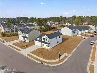 4499 Parsons Mill Drive, Castle Hayne, NC 28429 – photo 1: 02-DJI_20260108140850_0101_D-Edit