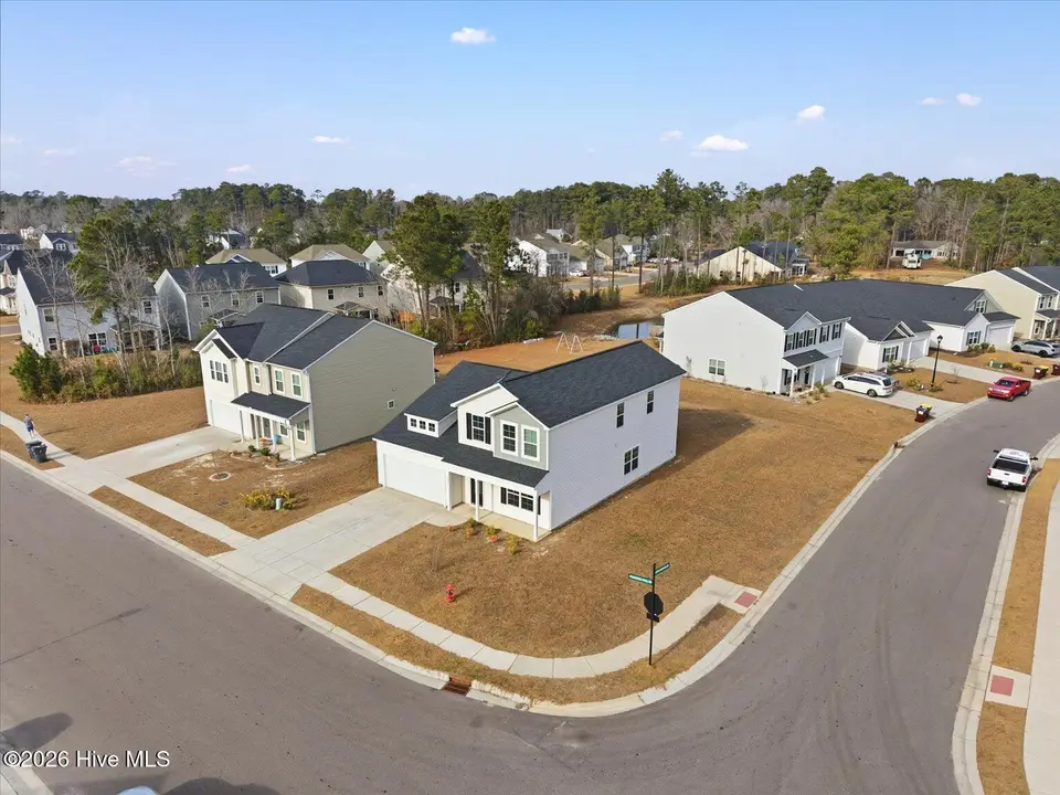 4499 Parsons Mill Drive, Castle Hayne, NC 28429 – photo 1 of 49: 02-DJI_20260108140850_0101_D-Edit