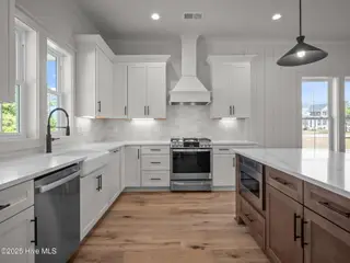 312 Cannonsgate Drive, Newport, NC 28570 – photo 17: Kitchen with Custom Wood Hood
