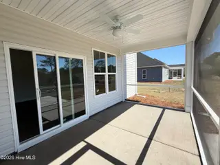 523 Country Club Villa Drive, Shallotte, NC 28470 – photo 11: Rear Screened Porch