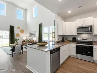 4242 Allsbrook Lane Unit 1010, Leland, NC 28451 – photo 11: Overlooking the Living Room
