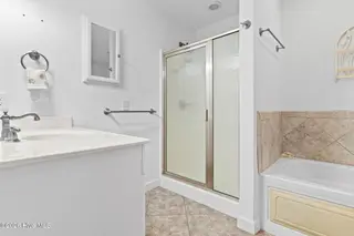 76 Calabash Drive, Calabash, NC 28467 – photo 19: Owners bathroom with walkin shower