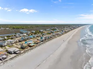 1717 W Beach Drive, Oak Island, NC 28465 – photo 8: 10-web-or-mls-DJI_20260416115956_0900_D