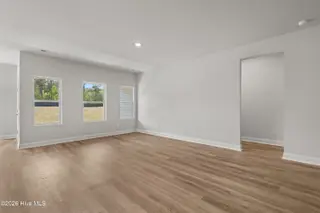 1731 Saucepan Bay Drive SW, Shallotte, NC 28470 – photo 12: Living space from dining area