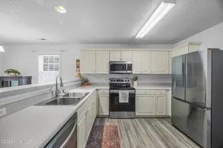 1112 Sunburst Way, Leland, NC 28451 – photo 23: 24_kitchen
