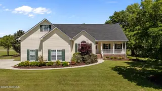 908 Taberna Circle, New Bern, NC 28562 – photo 1: 3-web-or-mls-DJI_20260423134221_0028_D