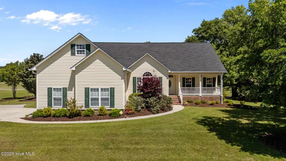 908 Taberna Circle, New Bern, NC 28562 – photo 1 of 77: 3-web-or-mls-DJI_20260423134221_0028_D