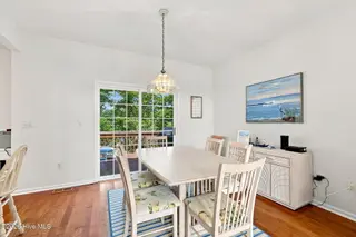 109 Oakleaf Drive, Pine Knoll Shores, NC 28512 – photo 17: Dining to back deck 2