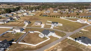 1058 Buckley Drive, Grimesland, NC 27837 – photo 10: 12-web-or-mls-DJI_20251112133220_0962_D