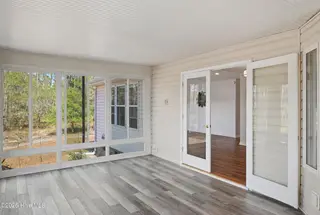 1281 Spring Lake Drive, Southport, NC 28461 — 3-bedroom home, Southport, NC, photo 23 of 46: Enclosed Back Porch