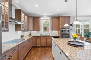 2585 Parkridge Drive, Southport, NC 28461 — 4-bedroom home in St James, Southport, NC, photo 18 of 77: Island includes Generous Cabinetry