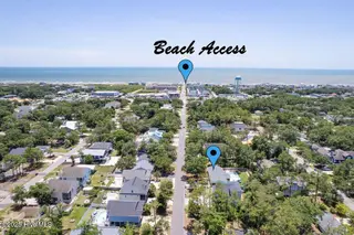 221 NE 58th Street, Oak Island, NC 28465 – photo 4: Beach is THERE