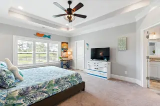 1353 Dunes Boulevard SW, Ocean Isle Beach, NC 28469 – photo 18: 1st floor owner's suite/trey ceiling