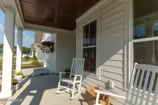 166 Twining Rose Lane, Holly Ridge, NC 28445 – photo 5: front porch 2 166