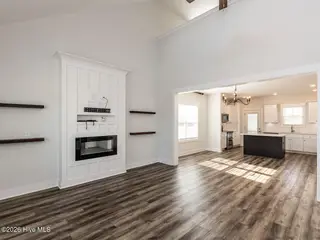 38 Muscadine Way, Smithfield, NC 27577 – photo 5: 006-1280x960-family-room-with-fireplace