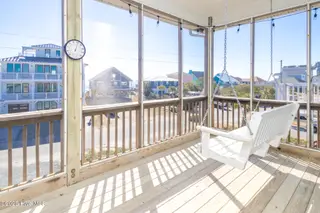 1131 S Shore Drive, Surf City, NC 28445 – photo 24: Top Floor Screened Porch
