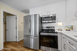 510 W Bogue Boulevard, Atlantic Beach, NC 28512 – photo 19: stainless appliances in kitchen