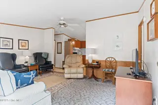 7203 Banner Street SW, Ocean Isle Beach, NC 28469 — 3-bedroom manufactured home in Seaside Heights, Ocean Isle Beach, NC, photo 9 of 38: Living Area