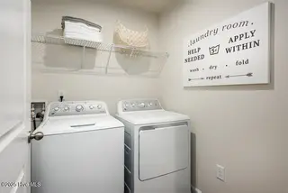 8081 Sterling Oaks Drive NW, Ash, NC 28420 – photo 5: Model Laundry
