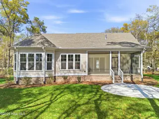 1943 Redfish SW, Supply, NC 28462 — 4-bedroom home in Oyster Harbour, Supply, NC, photo 4 of 42: Back Exterior