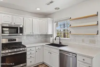 1281 Spring Lake Drive, Southport, NC 28461 — 3-bedroom home, Southport, NC, photo 11 of 46: Kitchen – Sink & Storage